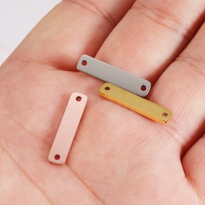 Polished stainless steel rectangular tags in silver, gold, and rose gold finishes