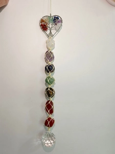 Detail of Tree of Life car charm with colorful natural stones and faceted glass prism