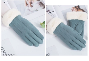 Detailed view of blue-gray suede gloves with faux fur cuffs and touch screen fingers