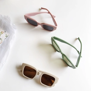 Vintage rectangle sunglasses in pink green and cream white with thick resin frames