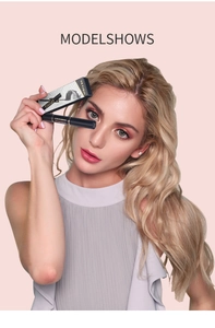 Model shows Fit Colors dual-ended waterproof mascara with elegant black and gold packaging