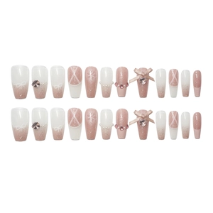 Nude pink gradient press-on nails with bow and pearl charms, set of 24 pieces