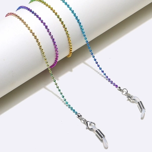Detail of colorful beaded glasses chains with non-slip silicone loops on white props