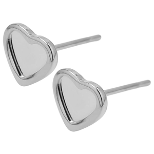 Macro view of heart-shaped stainless steel stud earrings with a polished silver finish