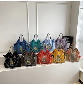 Detailed grid of colorful canvas tote bags with cartoon rabbit and rope handles