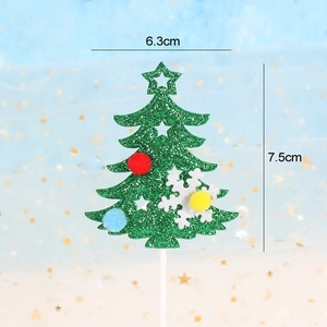 Detailed size view of a green glitter Christmas tree cake topper with festive pom-poms