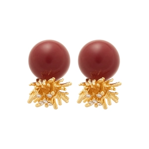 Deep red pearl earrings with coral gold base and sparkling crystals on white background