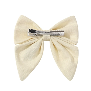 Barrette à cheveux nœud papillon en lin blanc cassé avec broderie et pince crocodile en métal