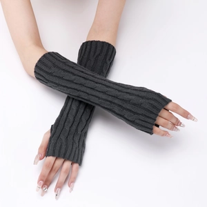 Detail view of long dark grey cable knit arm warmers with fingerless design for winter