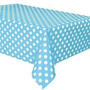 Light blue disposable tablecloth with white polka dots for racing birthday party