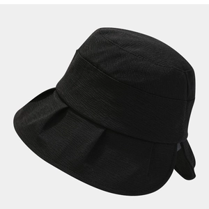 Black wide brim bucket hat for women with foldable bow design and sun protection