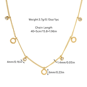Detailed view showing chain length, zircon size and ring dimensions of gold necklace