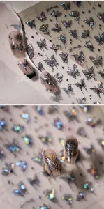 Macro detail of holographic butterfly nail stickers with artistic black outlines and glitter
