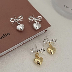 S925 silver bow and heart stud earrings in silver and gold-tone bicolor finish