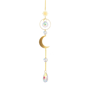 Detail of brass suncatcher with golden crescent moon and iridescent crystal prisms