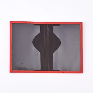 Open view of red and black PU leather passport holder showing clear internal card slots