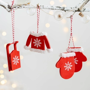 Nordic wooden Christmas ornaments with red sleigh, sweater and glove on tree