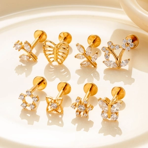 Gold F136 titanium stud set with 8 butterfly and flower zircon piercing designs
