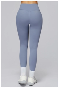 Close-up of fog blue high-waisted yoga leggings with V-shaped back seam and elastic fabric