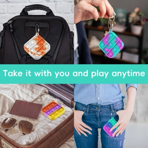 Mini silicone pop fidget toy keychain in various colors showing multi-scenario portability