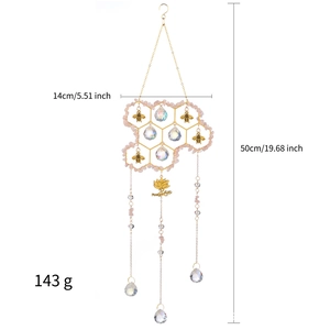 Detail of honeycomb suncatcher with pink crystals and bee ornaments including dimensions