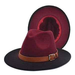 Classic fedora hat featuring a burgundy crown, black brim, and brown leather buckle band
