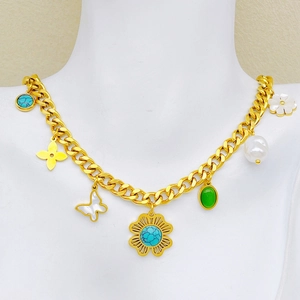 Bohemian gold chunky necklace featuring turquoise, pearl, and white shell floral pendants