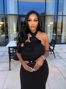 Elegant black bodycon dress with 3D floral ruffles and a chic halter backless design