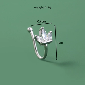 Detailed view of silver non-piercing nose clip with three marquise-cut zircons
