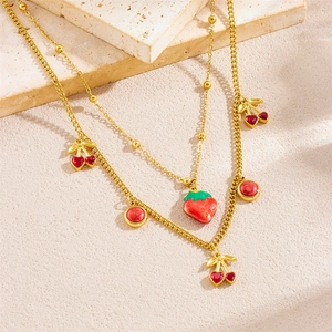 Golden double-layer stainless steel necklace featuring strawberry and cherry fruit charms