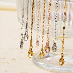 Polished stainless steel jewelry chains with lobster clasps in gold, silver, and rose gold