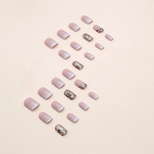 Short square French nails with white gradient, pink base, and red ruby glitter accents