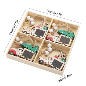 Close-up of four wooden Christmas car pendants in a box with size markings