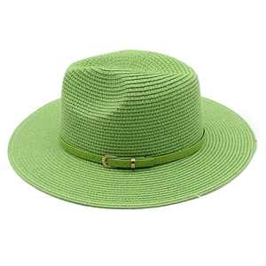 Detail of light green straw fedora hat with fine leather belt and golden metal buckle