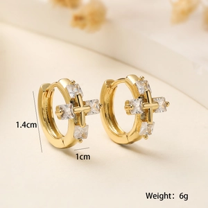Macro shot of gold cross earrings with zircon stones showing 1.4cm height dimensions