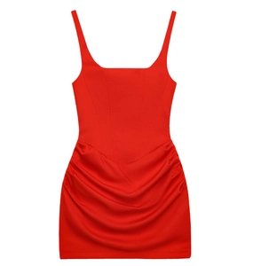 Detail view of red sleeveless mini dress featuring side ruching and gathered fabric texture