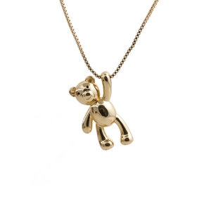 Elegant gold teddy bear pendant necklace with sparkling cubic zirconia on box chain
