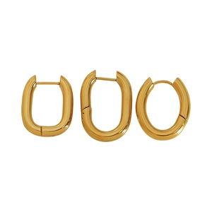 Three-piece gold plated U-shaped titanium steel hoop earrings set on white background