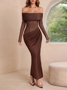 Detailed close-up of brown off-shoulder dress with elegant side waist cutout and ruched fabric