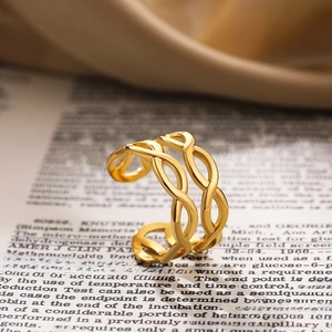 Close-up of 18K gold-plated braided leaf ring with adjustable open band and vintage finish