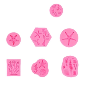 7-piece set of pink silicone ocean theme molds including starfish, seahorse, and coral designs