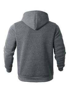 Detail view of the back of a dark grey hoodie featuring premium knitted texture and ribbed hem