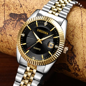 Macro detail of luxury steel watch featuring a black dial and golden fluted bezel