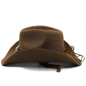 Detailed close-up of dark brown woven straw cowboy hat with leather band and metal buckle