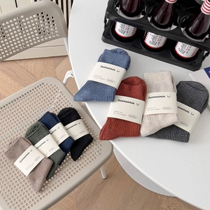 Classic ribbed cotton mid-calf socks for men in various colors for casual or business wear