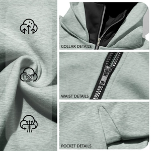 Detail of grey double-layered hooded jacket showing breathable knit fabric and zipper pockets