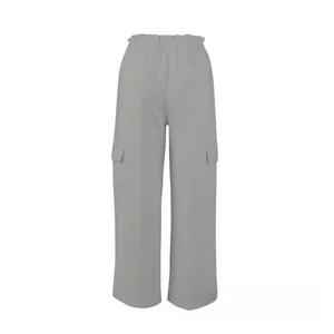 Close-up of light gray wide-leg cargo pants featuring high waist and large side pockets
