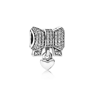 Bow charm with pave cubic zirconia and polished heart pendant for DIY bracelets