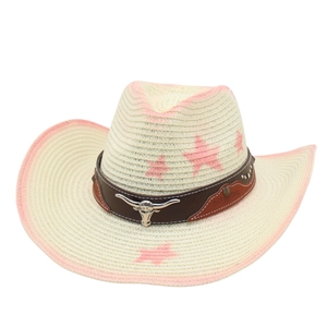 Detail of cowboy straw hat with pink star patterns and silver bull head metal buckle