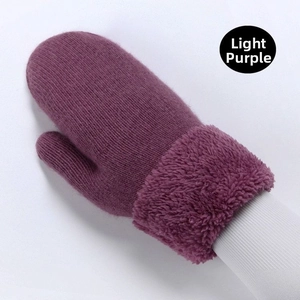 Close-up of light purple knitted mittens with thick plush faux fur cuffs on model